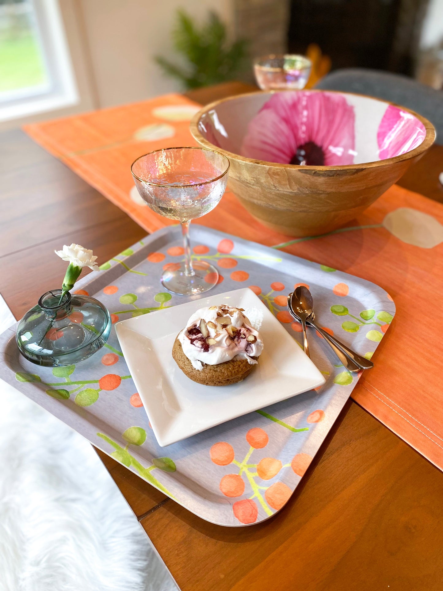 Serving tray featuring orange and green berries close square shape