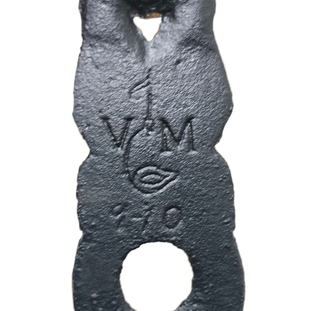 trivet cast iron VM close up